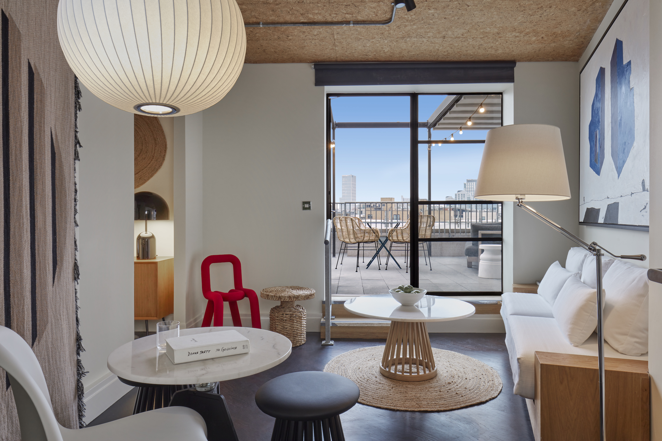 A cosy lounge area with plush seating and elegant decor, inviting guests to relax and enjoy the ambiance.