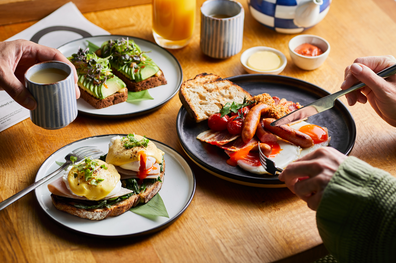 A table set with an array of food and drinks, inviting and ready for a gathering or celebration.